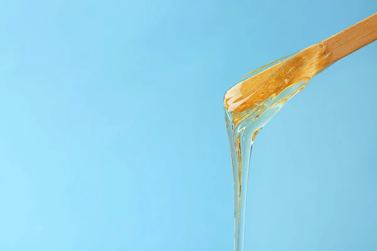 Wax falling off a wooden stick