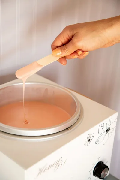 Client preparing for first Brazilian wax at Rejuvenate You studio